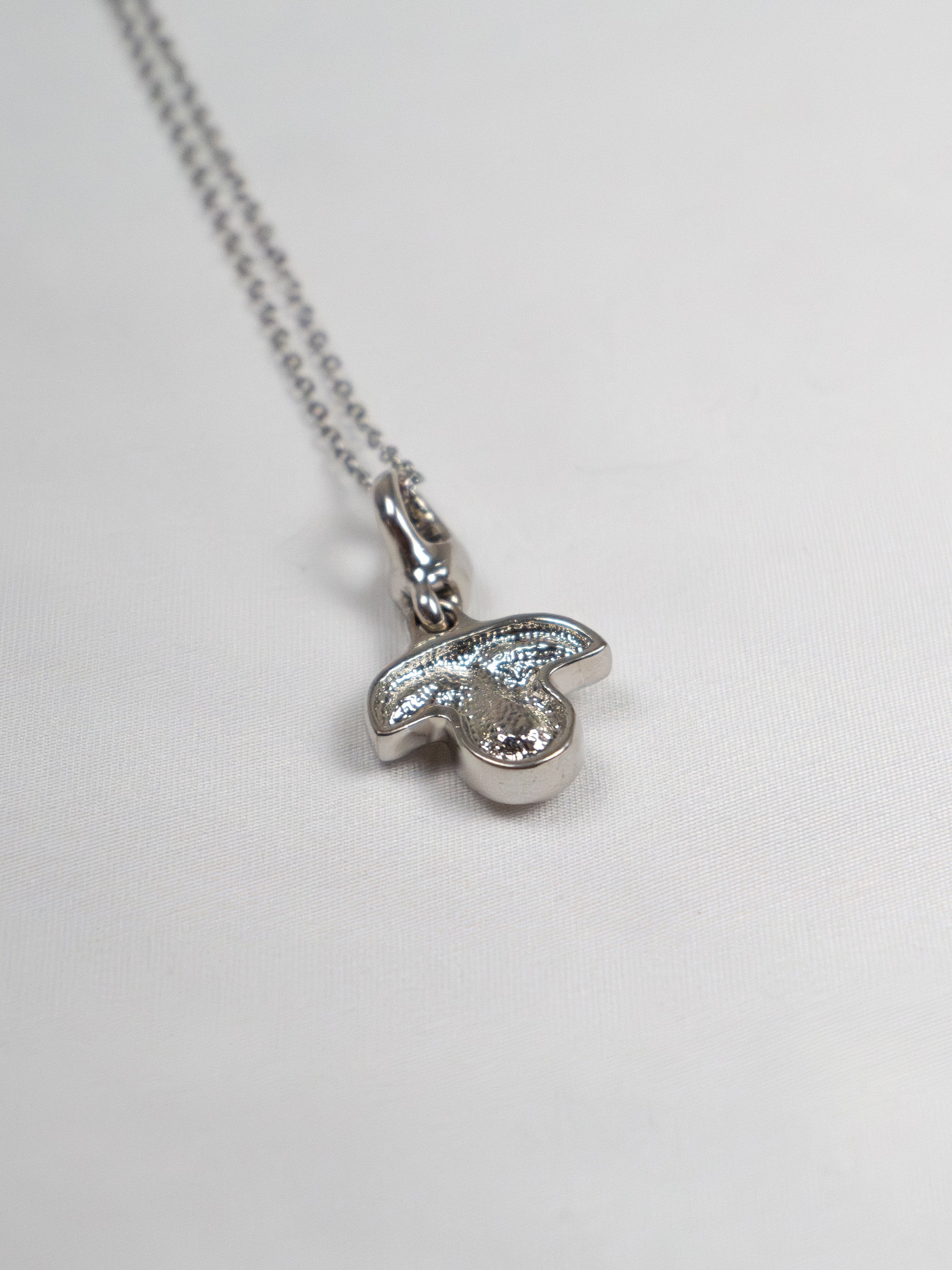 CRYSTAL PETAL SILVER NECKLACE