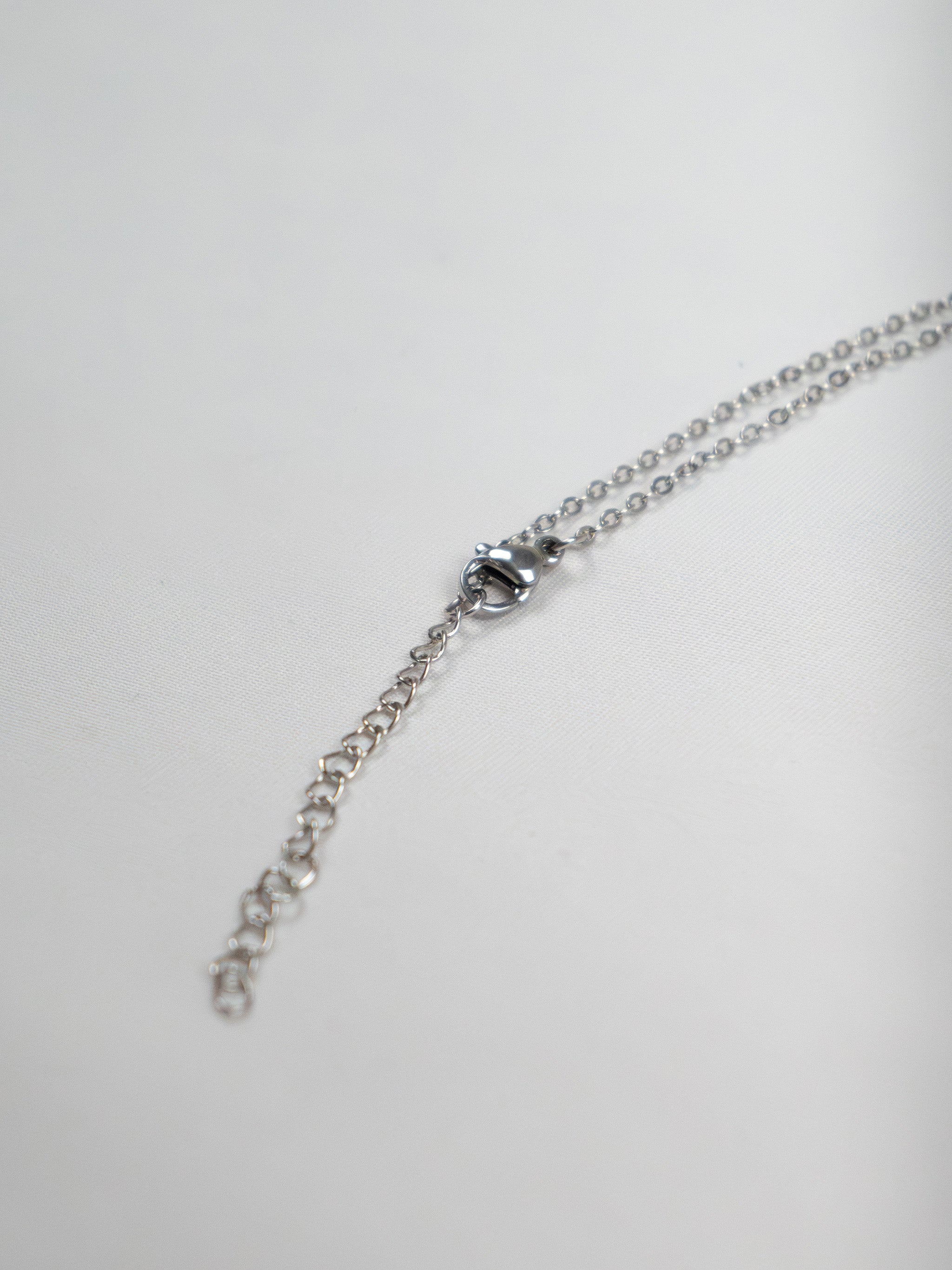 CRYSTAL PETAL SILVER NECKLACE