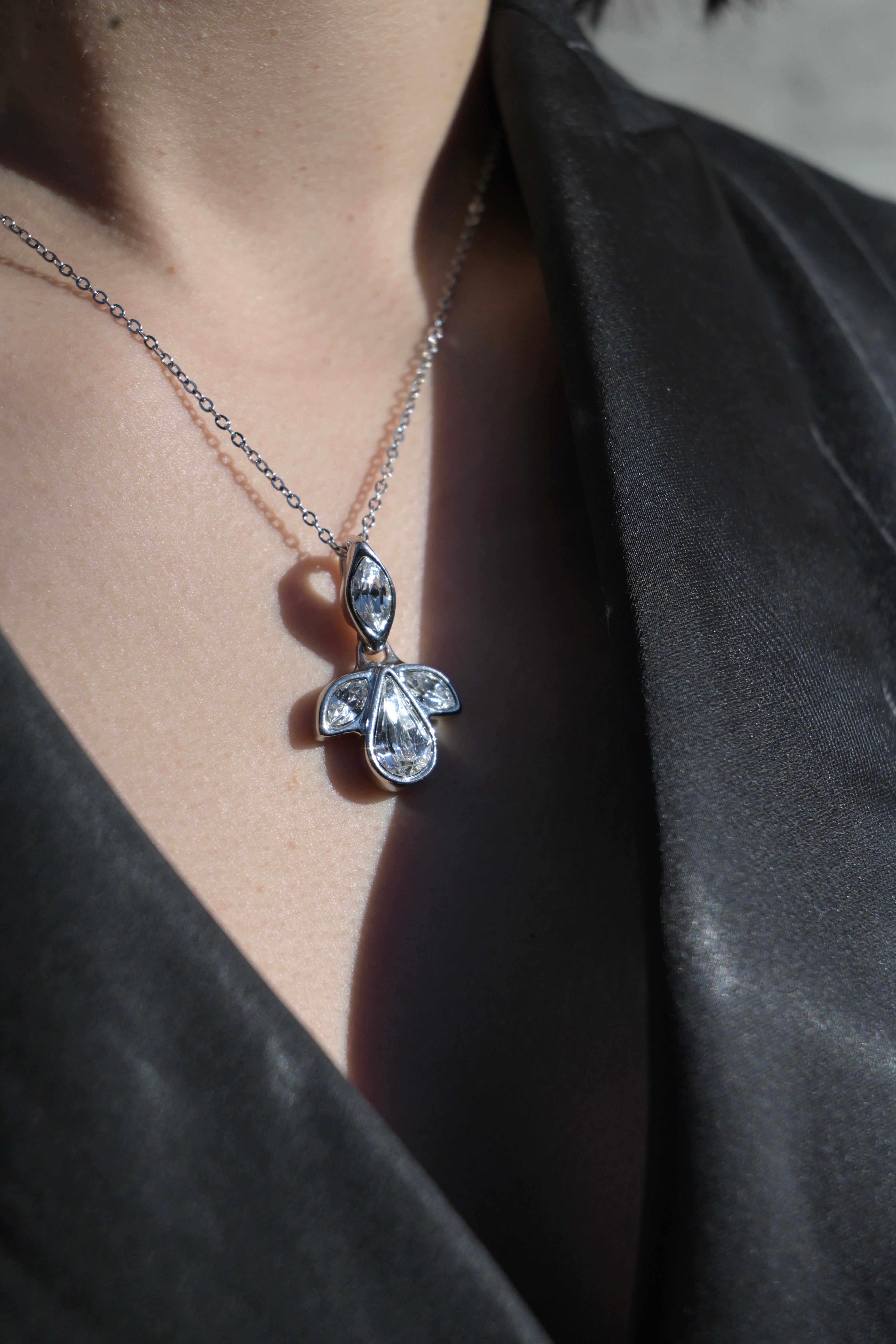 CRYSTAL PETAL SILVER NECKLACE