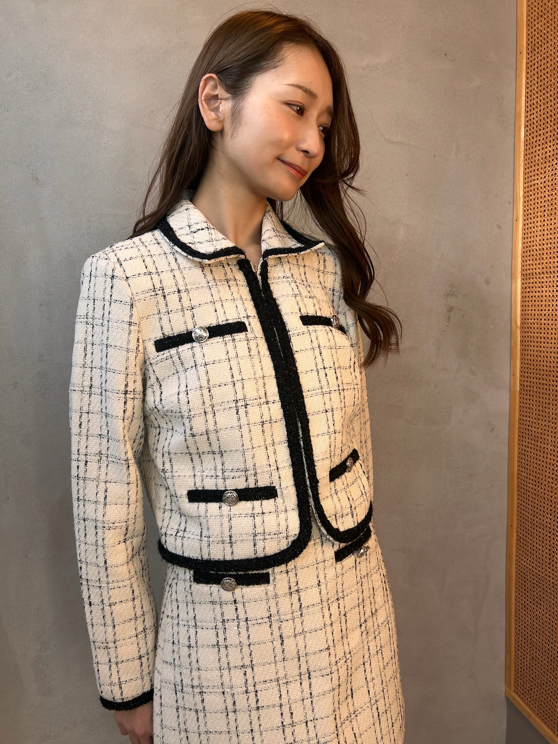 Set up cropped checkered jacket and skirt